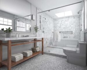 Modern bathroom renovation in Toronto with a wall-mounted wood vanity, integrated sink, and textured grey wall tiles
